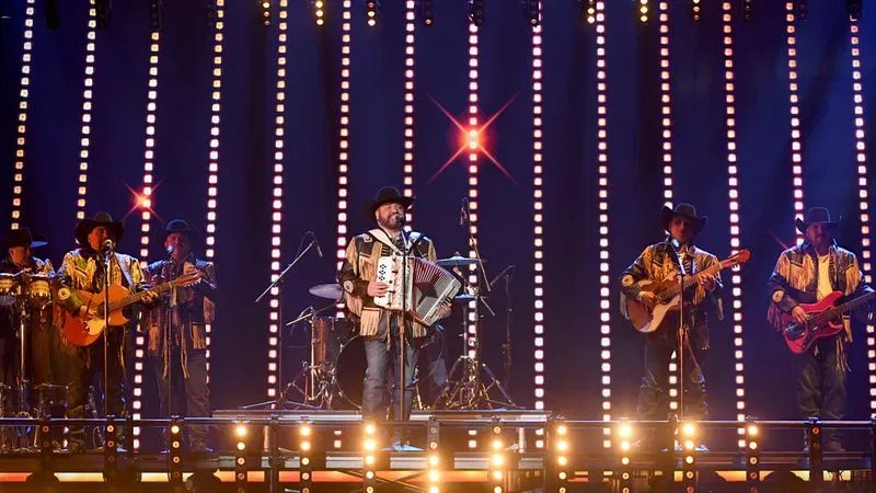 Intocable performing on tour